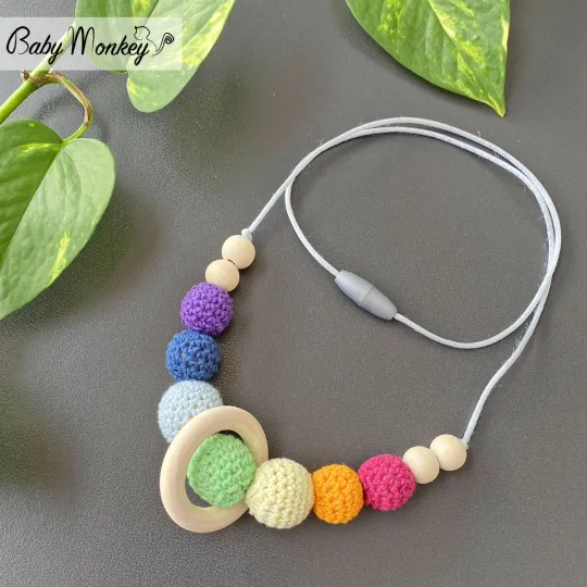 Breastfeeding and teething necklace with wooden ring