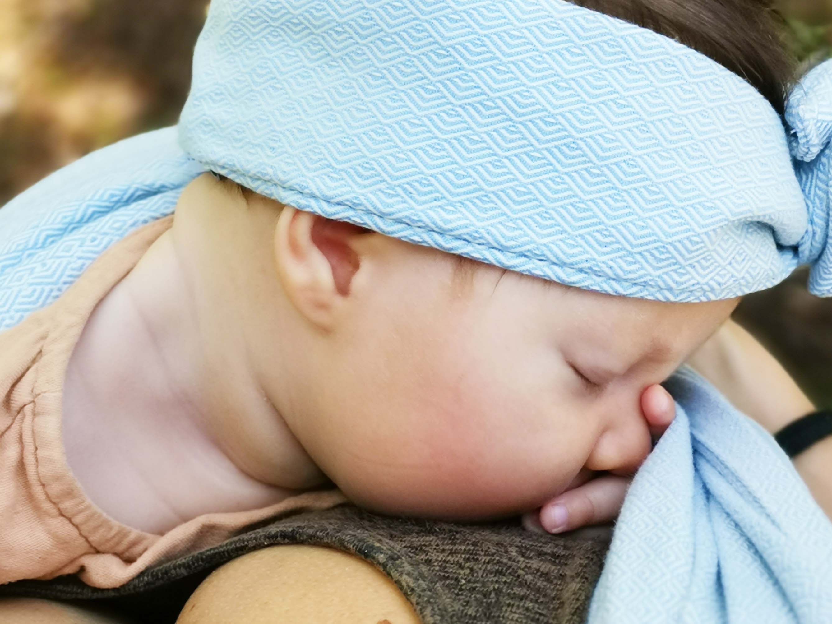 Babywearing eine Hilfe bei Koliken und Reflux